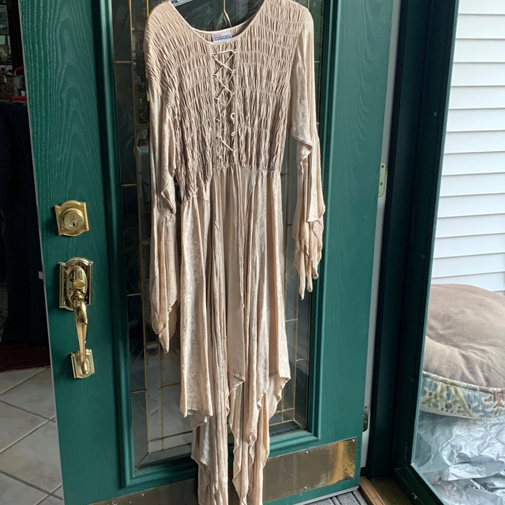 Multi tiered bottom, Beige dress. Free size. Gently worn, like new.
